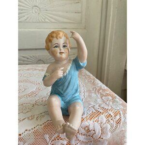 Antique German Bisque Porcelain sitting Piano Baby Figurine 5.5